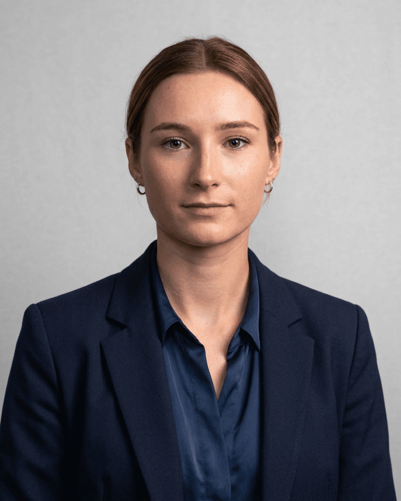 A young female client manager in a black blazer